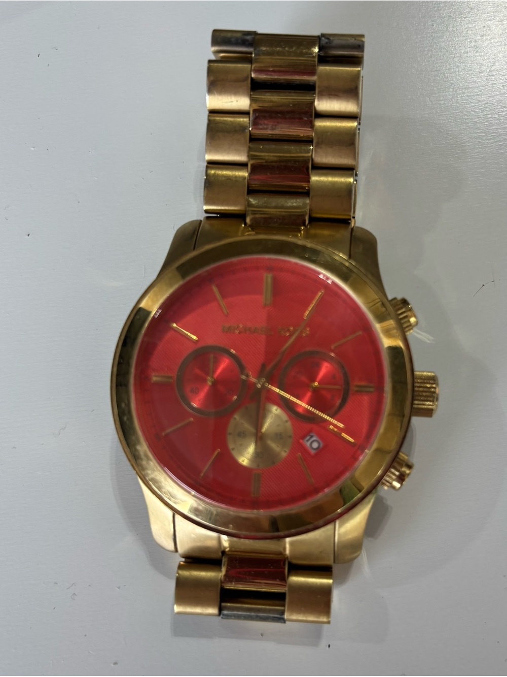 Michael Kors Gold-Tone Watch with Red Dial and Gold Accents